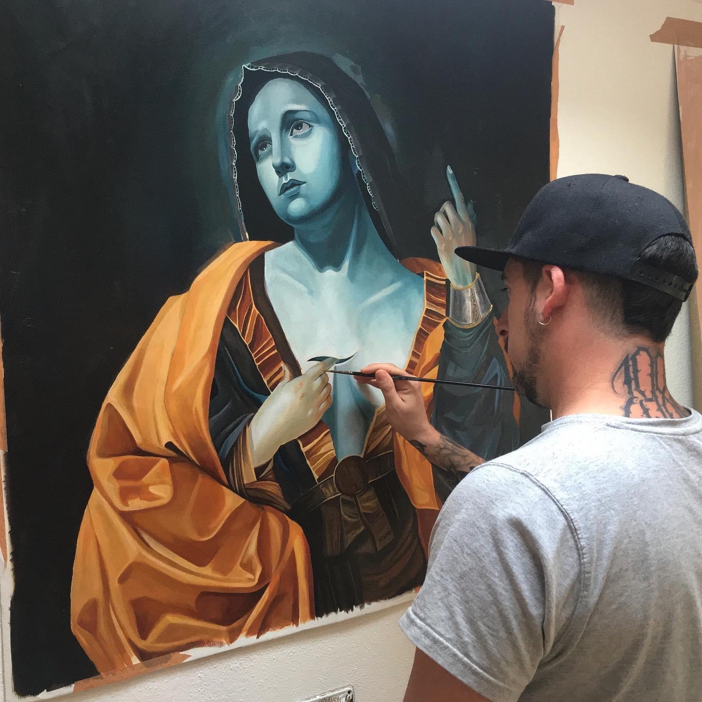 Juano Frías painting Madonna delle Stelle at the easel